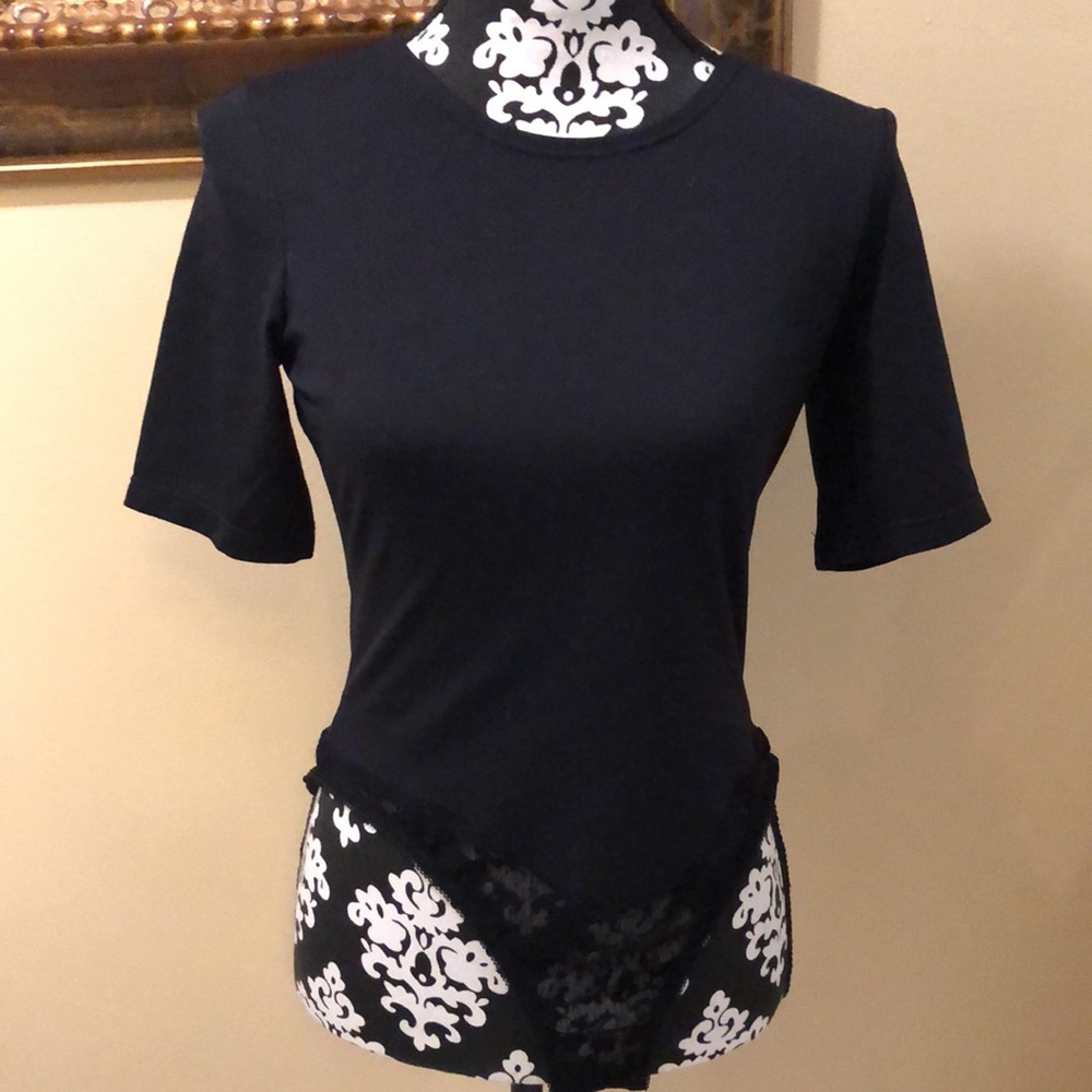 A’nue Ligne short sleeved luxe stretch bodysuit with lace panty snap close